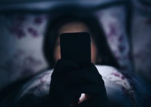Using phone in bed, in poor light